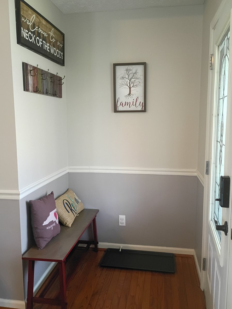 The front entrance provides a shoe corner and coat rack for added convenience. Additionally, there is a coat closed located in the hallway.