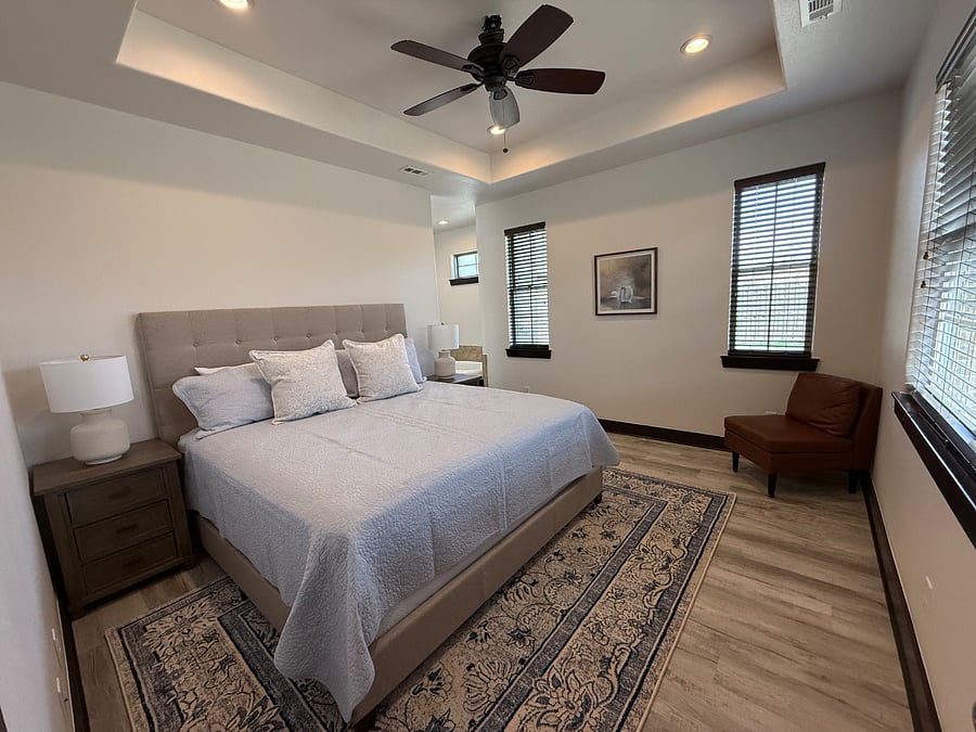 Primary Suite boasts new King Bed, large room layout, private full bath with whirlpool tub and extensive walk-in closet. All new flooring & paint.