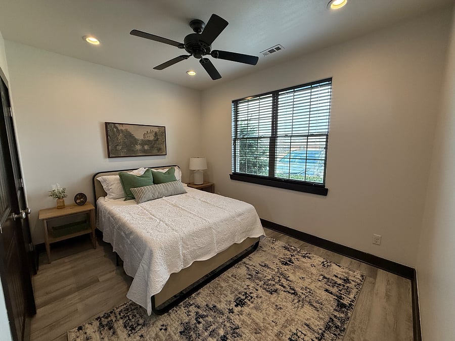 Secondary BR with New Queen Bed and all new paint and flooring.
