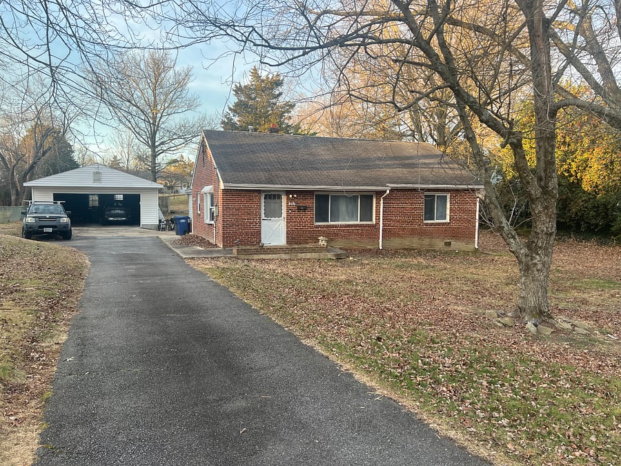 Two-car garage plus extra space on long driveway