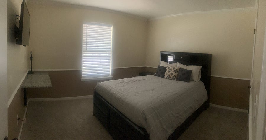 Bedroom 3: Queen bed and desk