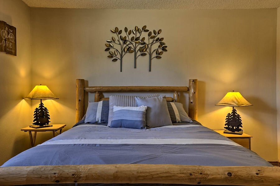2 queen beds and a bunk with a full on bottom and twin on top