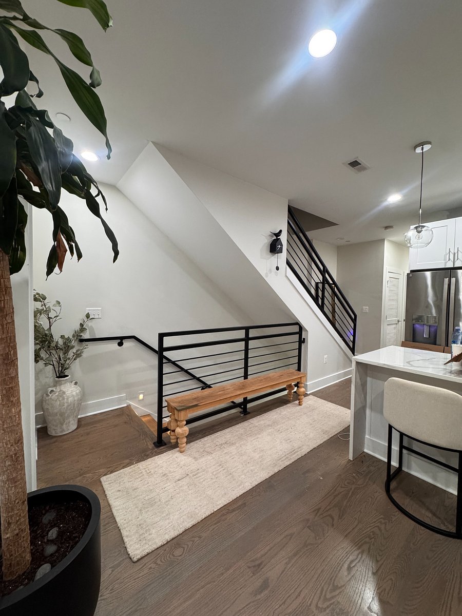 Stairs that lead to the unit which is on the 3rd floor.