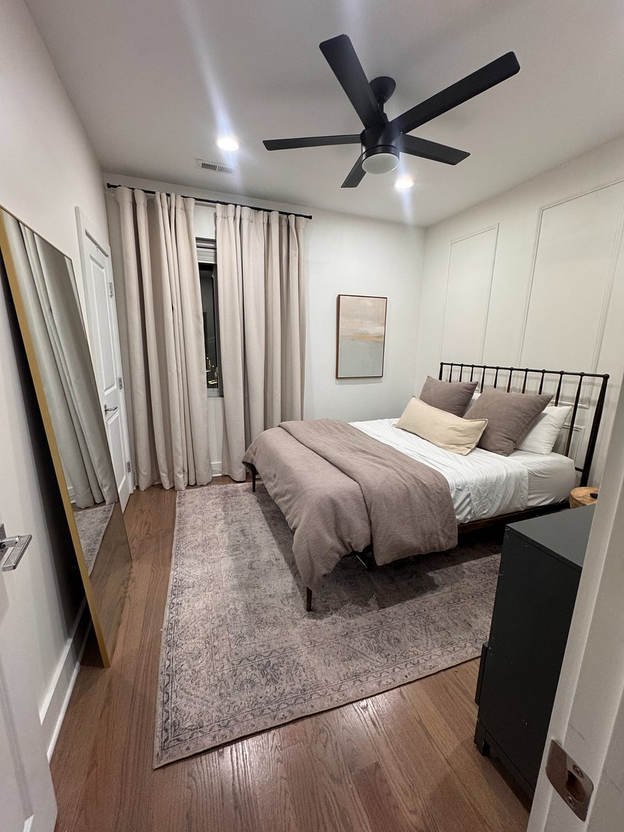 The primary bedroom has a queen "Purple" brand mattress and an attached full bathroom 
