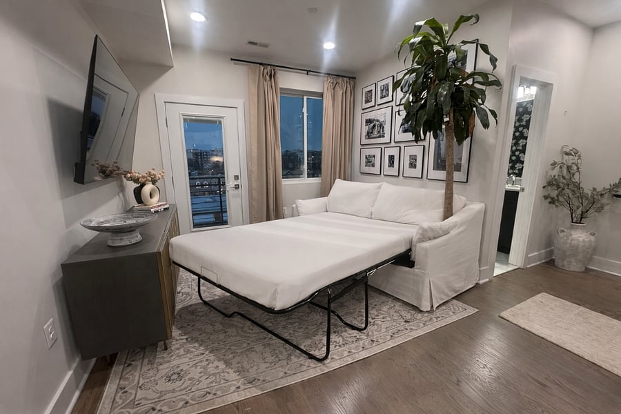 The living room couch folds out to a queen sized bed for guests. Sheets are included. 