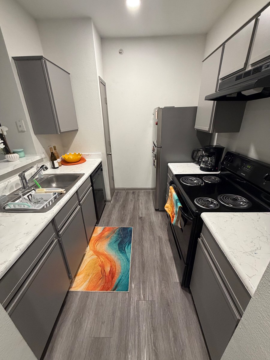 Full kitchen with microwave, dishwasher and basic cookware