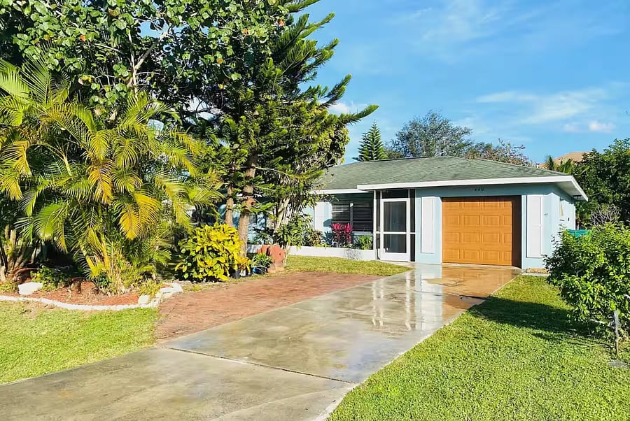Front of the home with free on-site parking, offering easy access and added convenience throughout your stay.