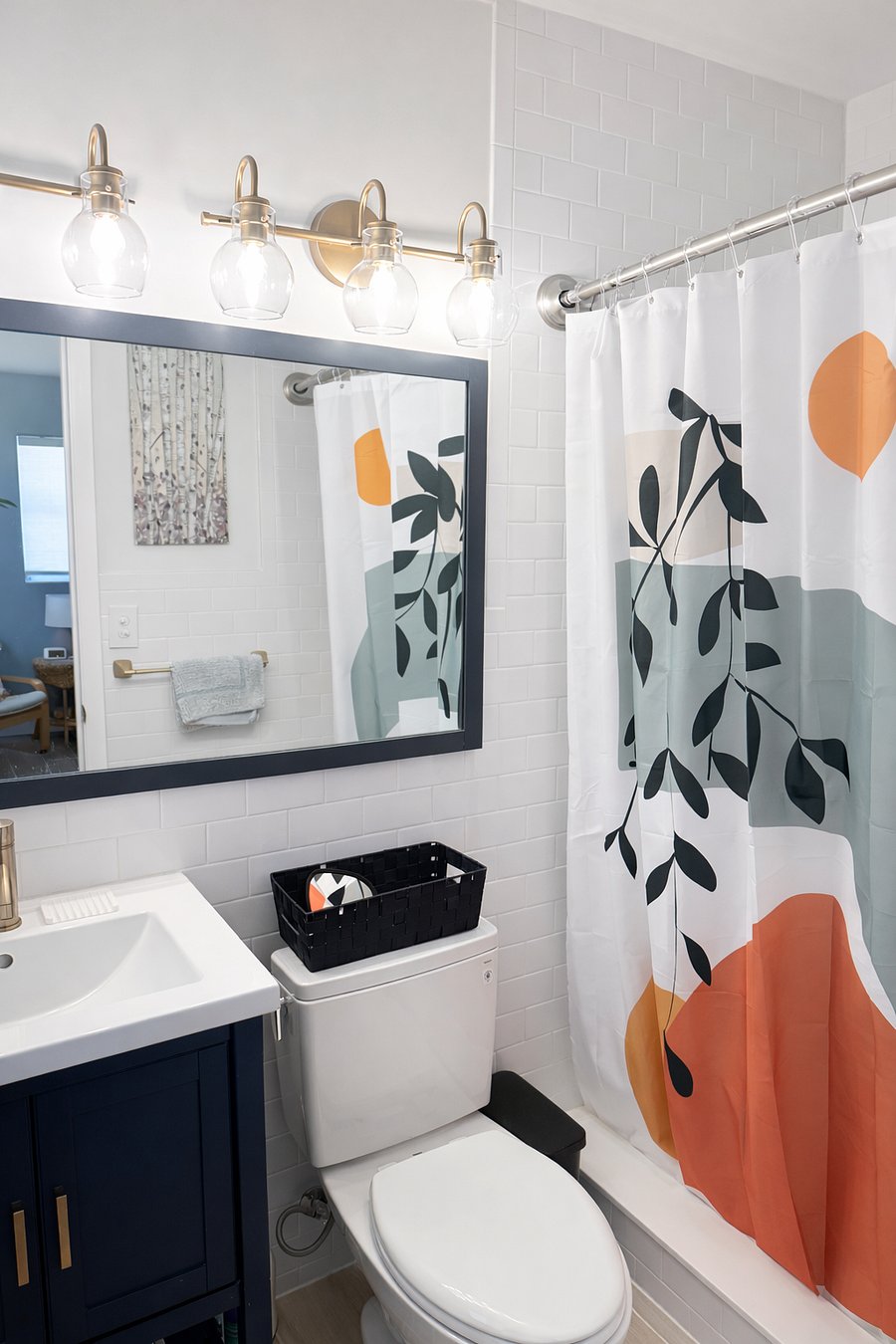 Bright master bathroom with a walk-in shower, modern finishes, and a clean, fresh design for a comfortable stay.