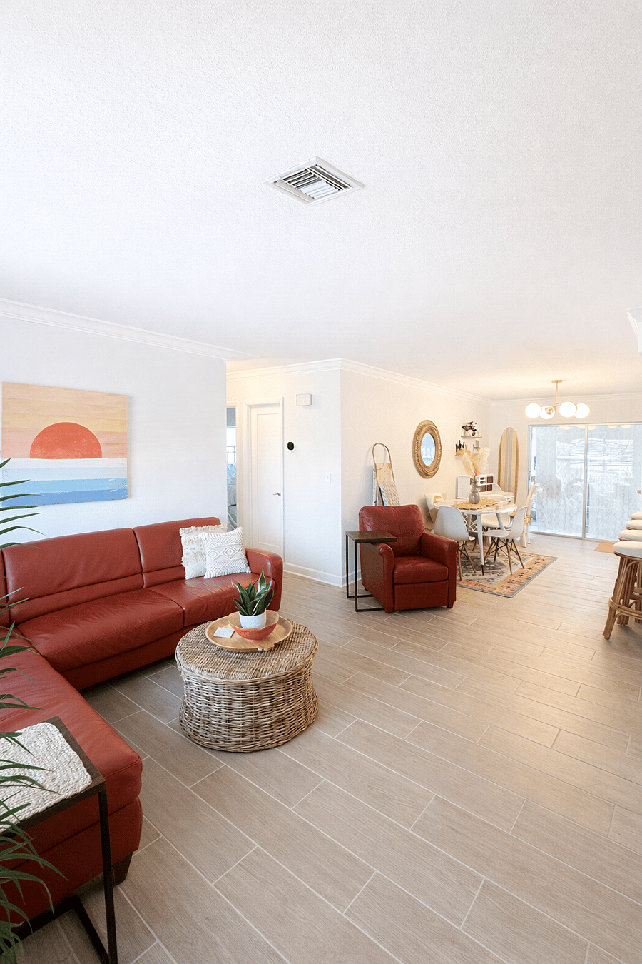 Open and airy main living area with comfortable seating and plenty of natural light. Seamless flow to the dining space, making it ideal for relaxing, gathering, and spending time together.