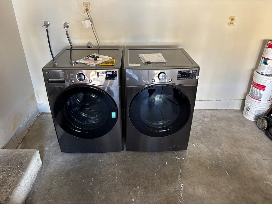 Brand-new washer and dryer inside the garage