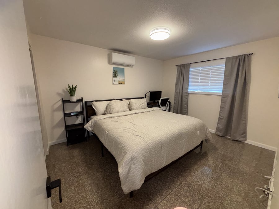 This big bedroom features a comfortable king sized bed, brand-new smart TV, and an office table and chair. The 27 inch monitor enables you to work from home, or steam games from your computer with ease via HMDI cable. Just installed a 3 zones HVAC mini split.
