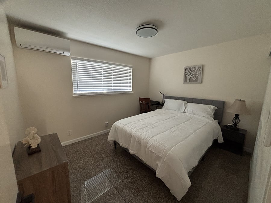 Bedroom 2 with a brand-new Queen bed and a desk for working from home. Just installed a 3 zones HVAC mini split system.