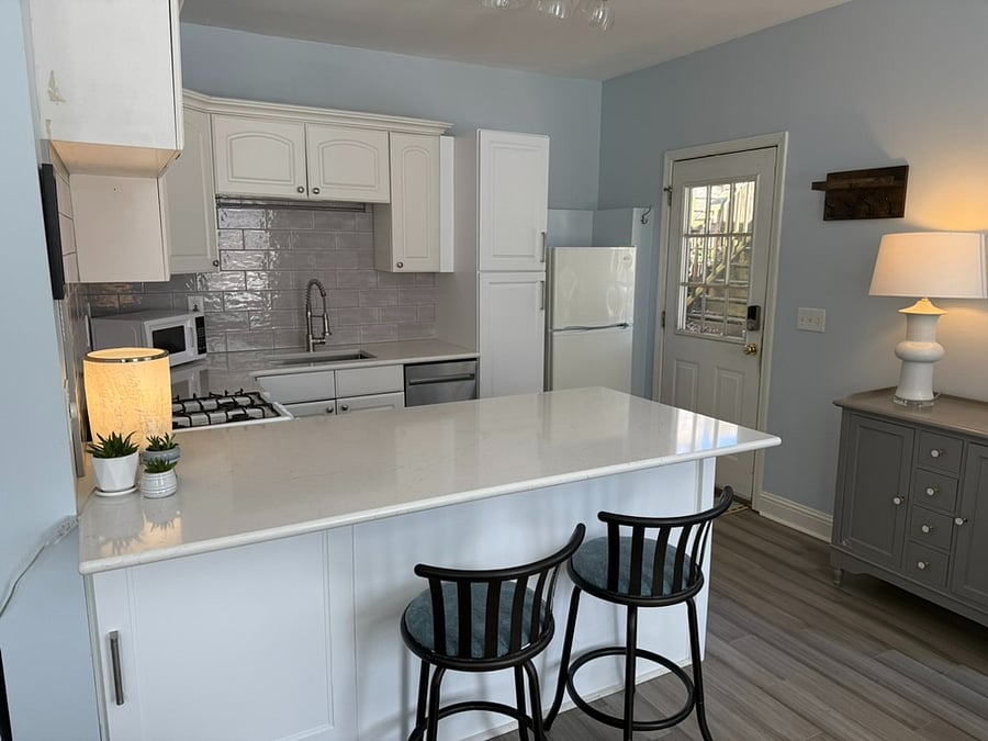 Kitchen + door to exterior patio