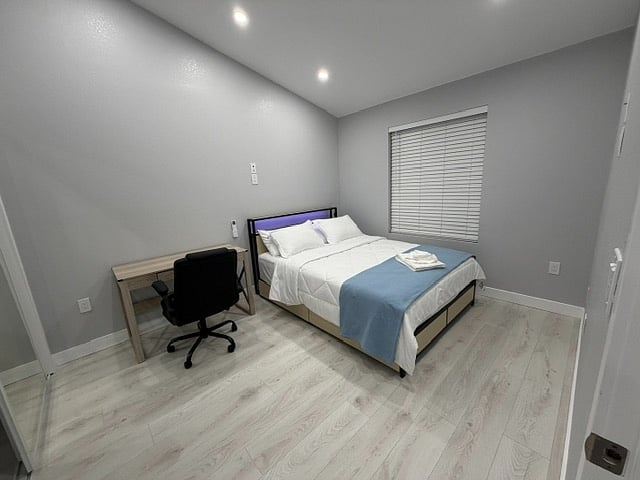 Bedroom with Queen Bed and Desk