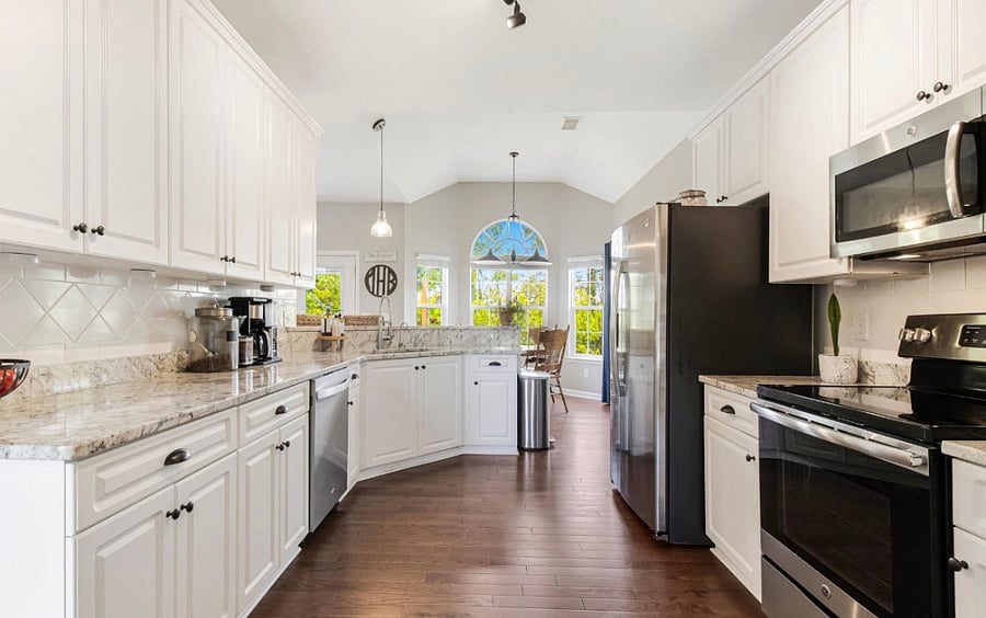 well stocked kitchen with Keurig coffee maker and latte spinner