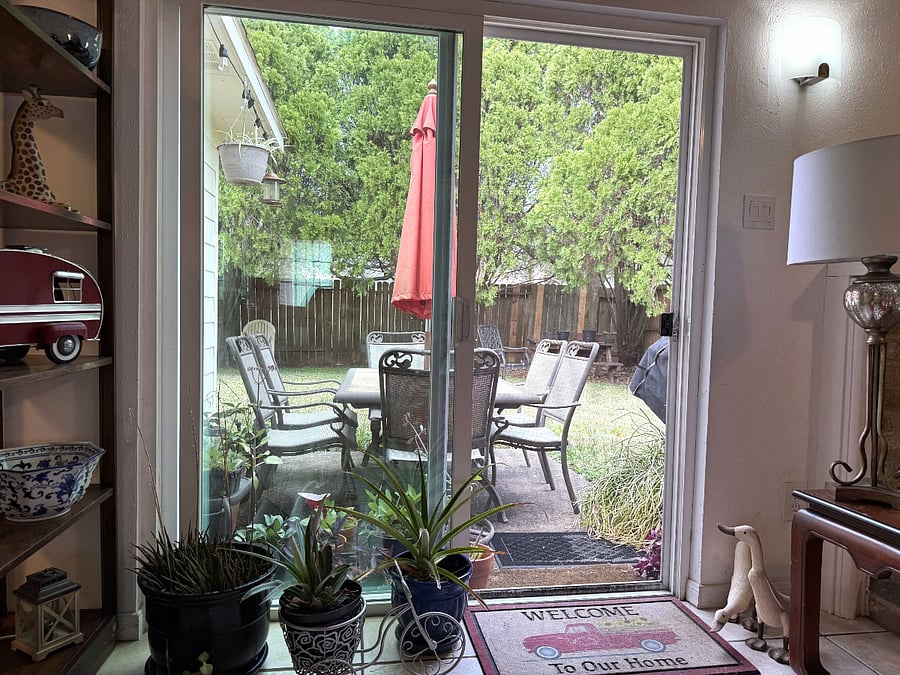 Peaceful backyard patio with outdoor seating and relaxing outdoor space.