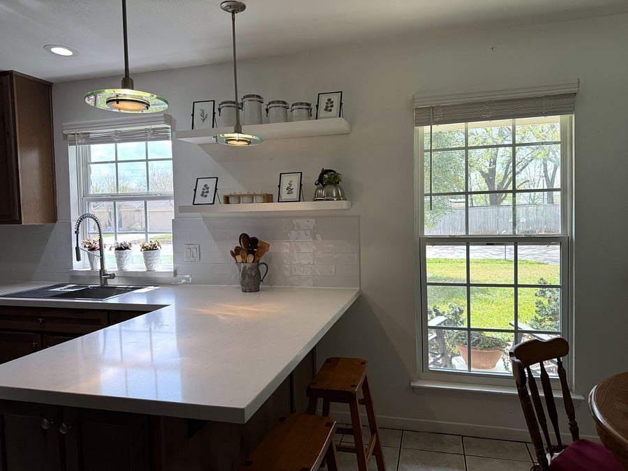 Kitchen and dining area with natural light, beautiful views, and space for meals or quiet work.