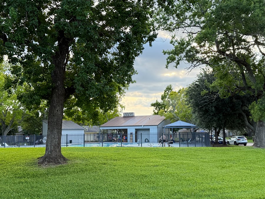 Well-maintained recreational courts and outdoor amenities available nearby