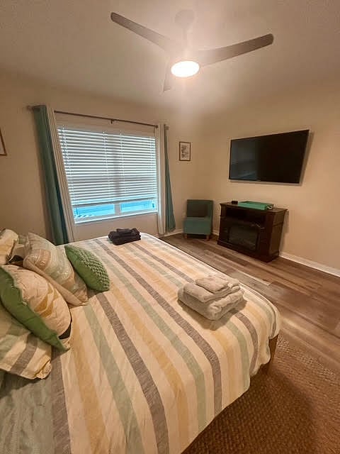 Primary Bedroom:
55" Apple TV, Electric Fireplace