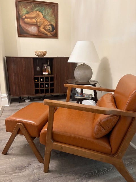 Note: Alcohol in credenza not included.