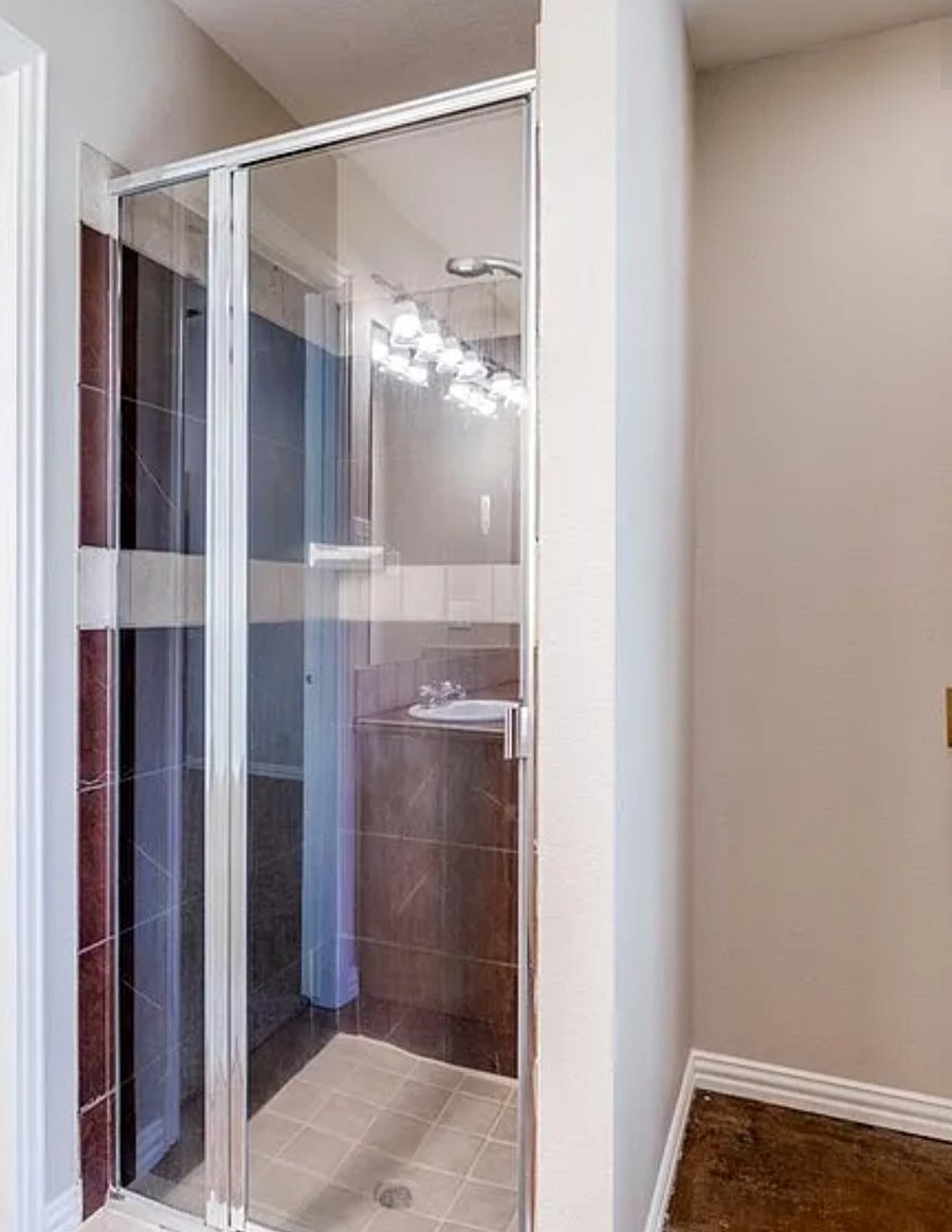Master bath shower and it has a jacuzzi tube.