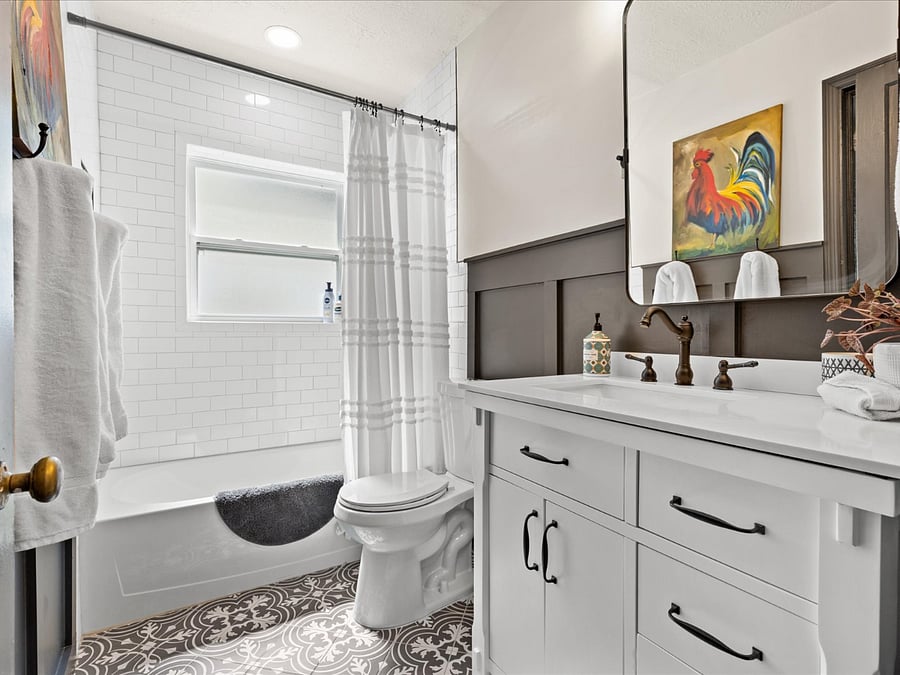 Secondary bath can be dedicated to second bedroom or used as guest bathroom.