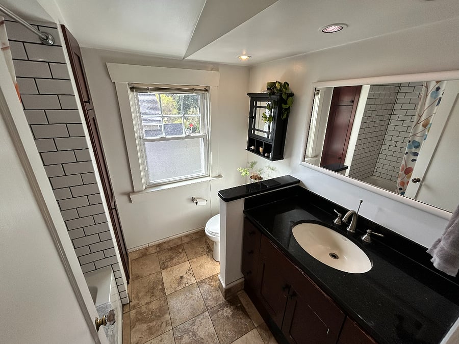 Upstairs bathroom with shower.
