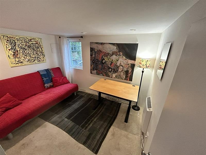 Third bedroom, currently used as an office/guest room. Couch folds out into a double bed.