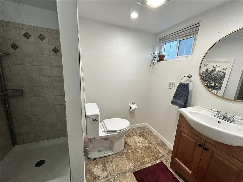 Second bathroom- this one has a shower.