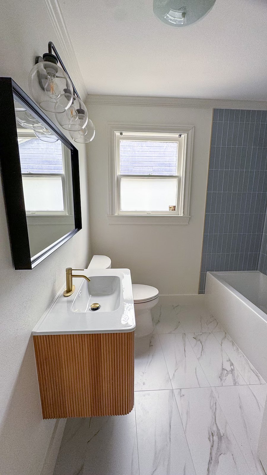 Fully renovated guest bathroom.