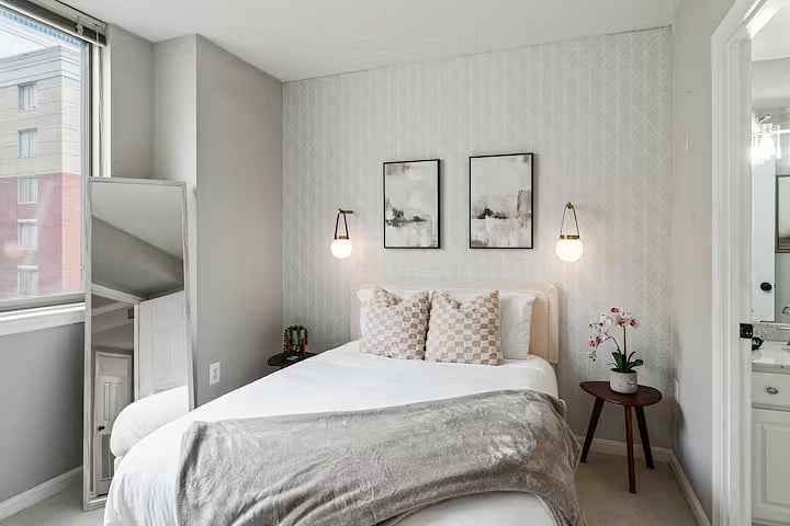 memory foam Bed, wall mounted light sconces, smart TV, linen, walk in closet, attached full bathroom