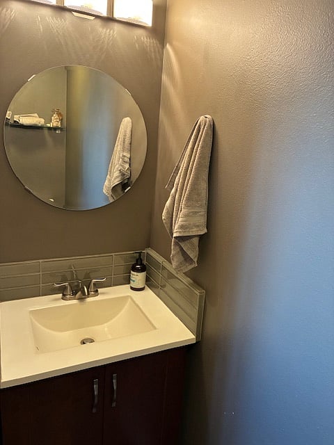 half bathroom located off the laundry room