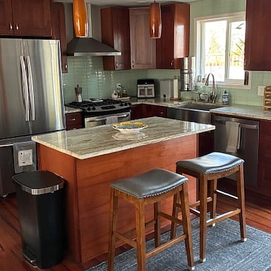 open kitchen space with island and seating