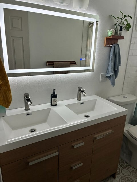 full bathroom with LED mirror