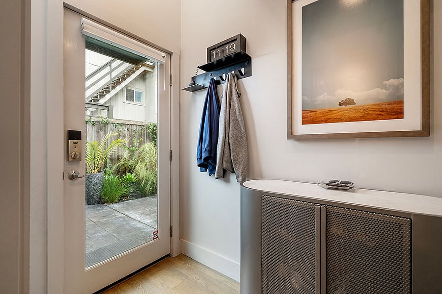 Foyer with coat rack and storage