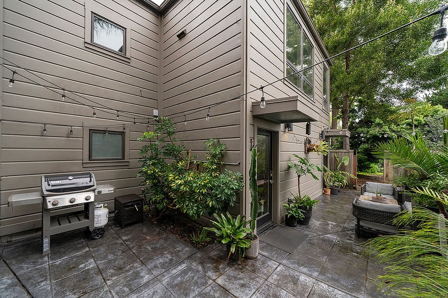Private patio with shared grilling area