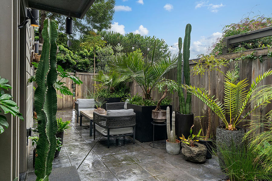 Private patio with couch and chairs
