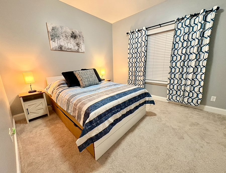 Room 2. Full size bed with twin trundle.