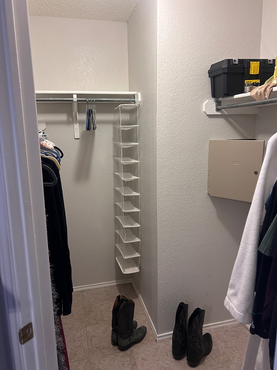 Large bedroom closet, three hanging rods plus plenty of shelf and floor space!