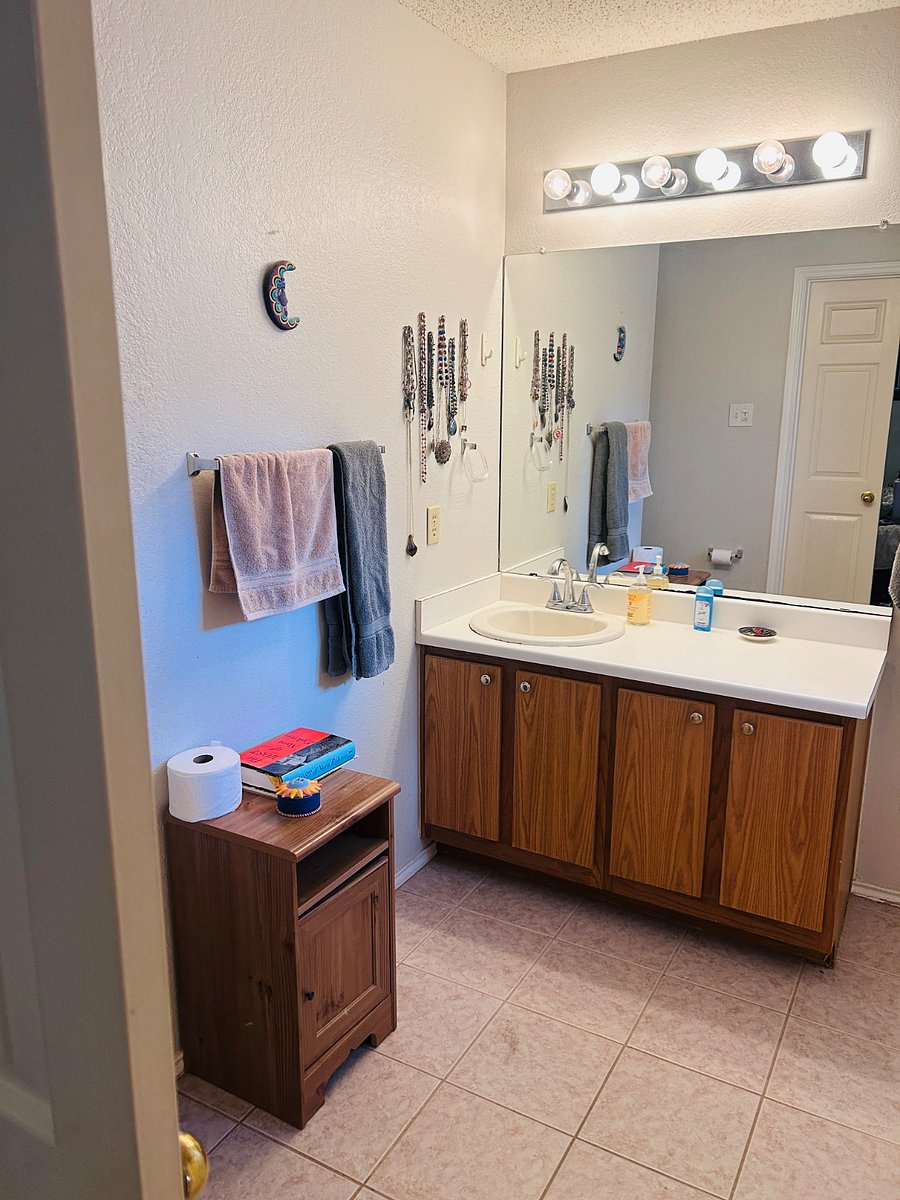 Primary bath--large room with plenty of counter space, extra-large tub, large closet