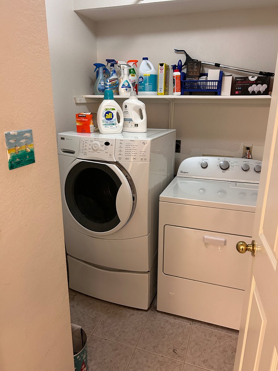 Excellent large washer and dryer in separate laundry room with door