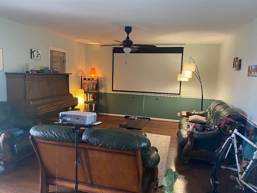 Main living room space with projector