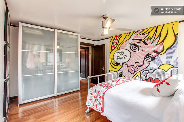 Good Night and sweet dreams in the second floor guest bedroom with a queen bed, chair, and closet.
