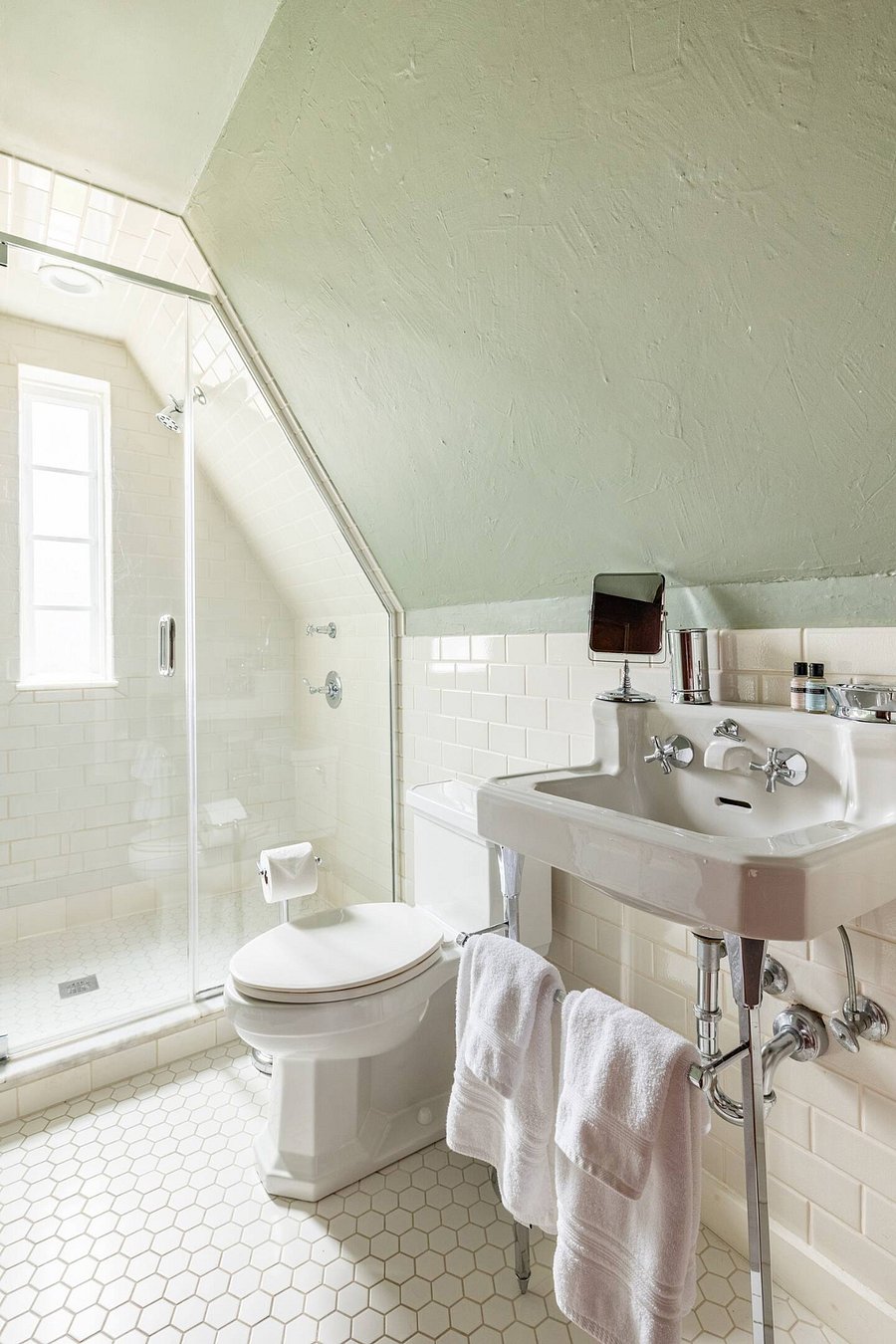 The attic alcove bathroom has a great shower with a view.