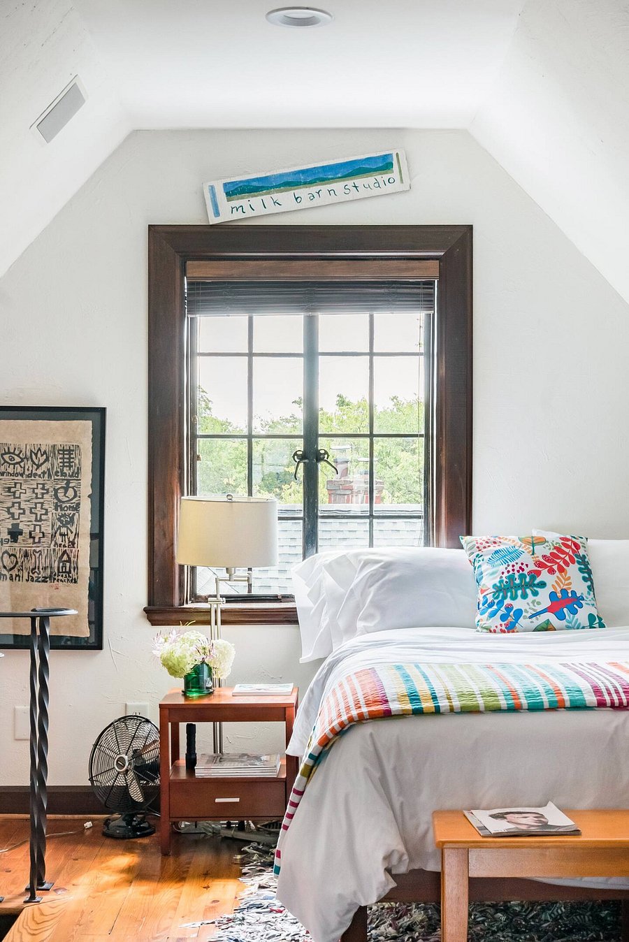 Sleep in an active artist studio in the attic studio bedroom.  This bedroom has a queen bed, and shares a bath with another bedroom.