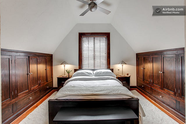 The attic bedrom has a queen bed, the ensuite attic bath and built in cabinets.