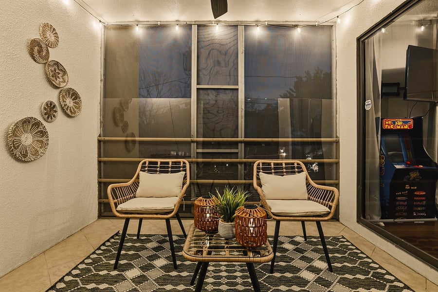 Private balcony (we have 3) with mini foosball game, seating and lanterns.