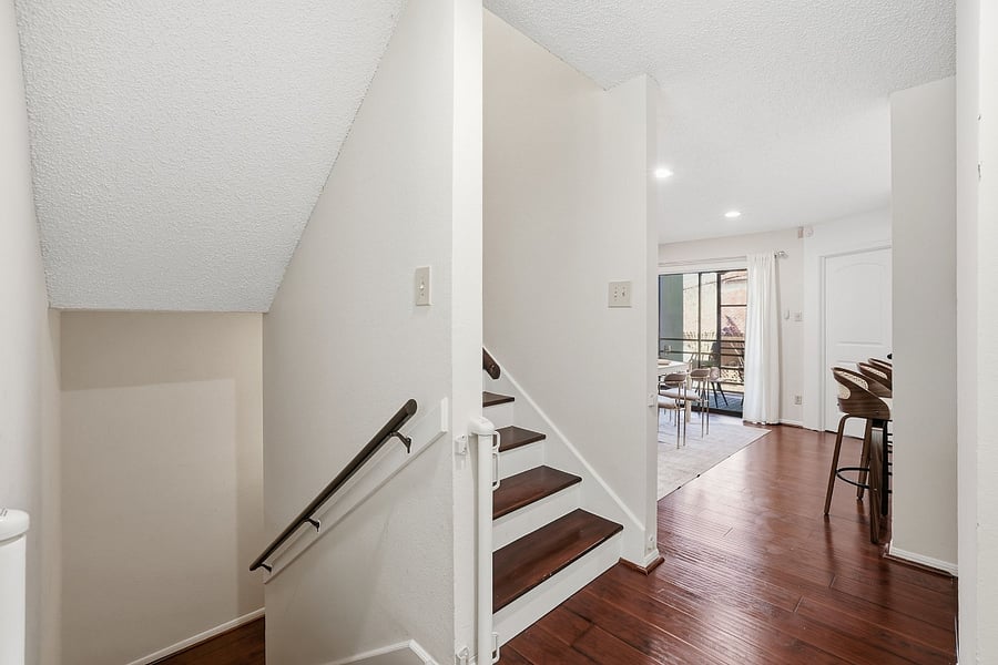 Retractable gates at stairs are helpful for babies and pets.