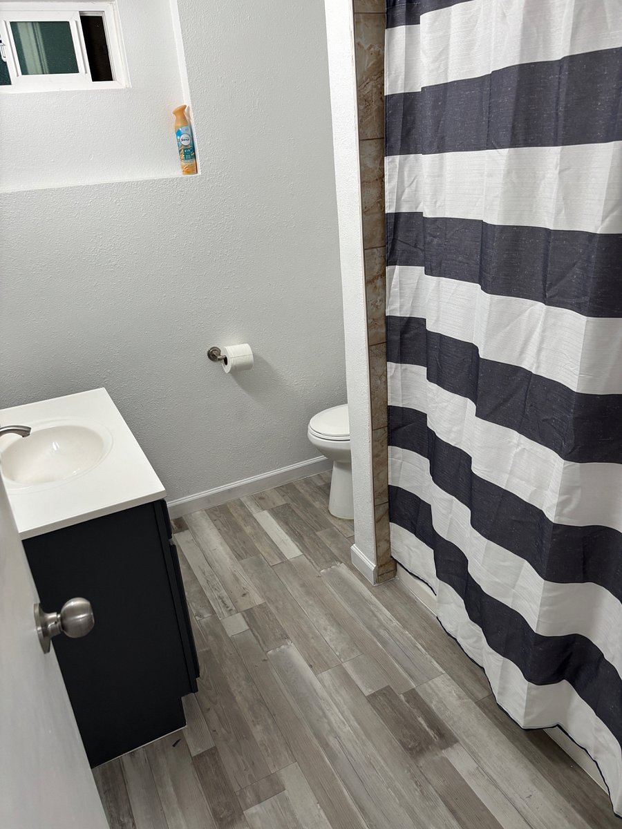 Suite 2 and 3 includes this shared full bath.