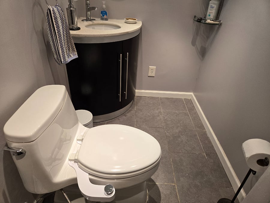 Convenient half bath on main level. There is another half bath in the basement, adjoining the laundry room.